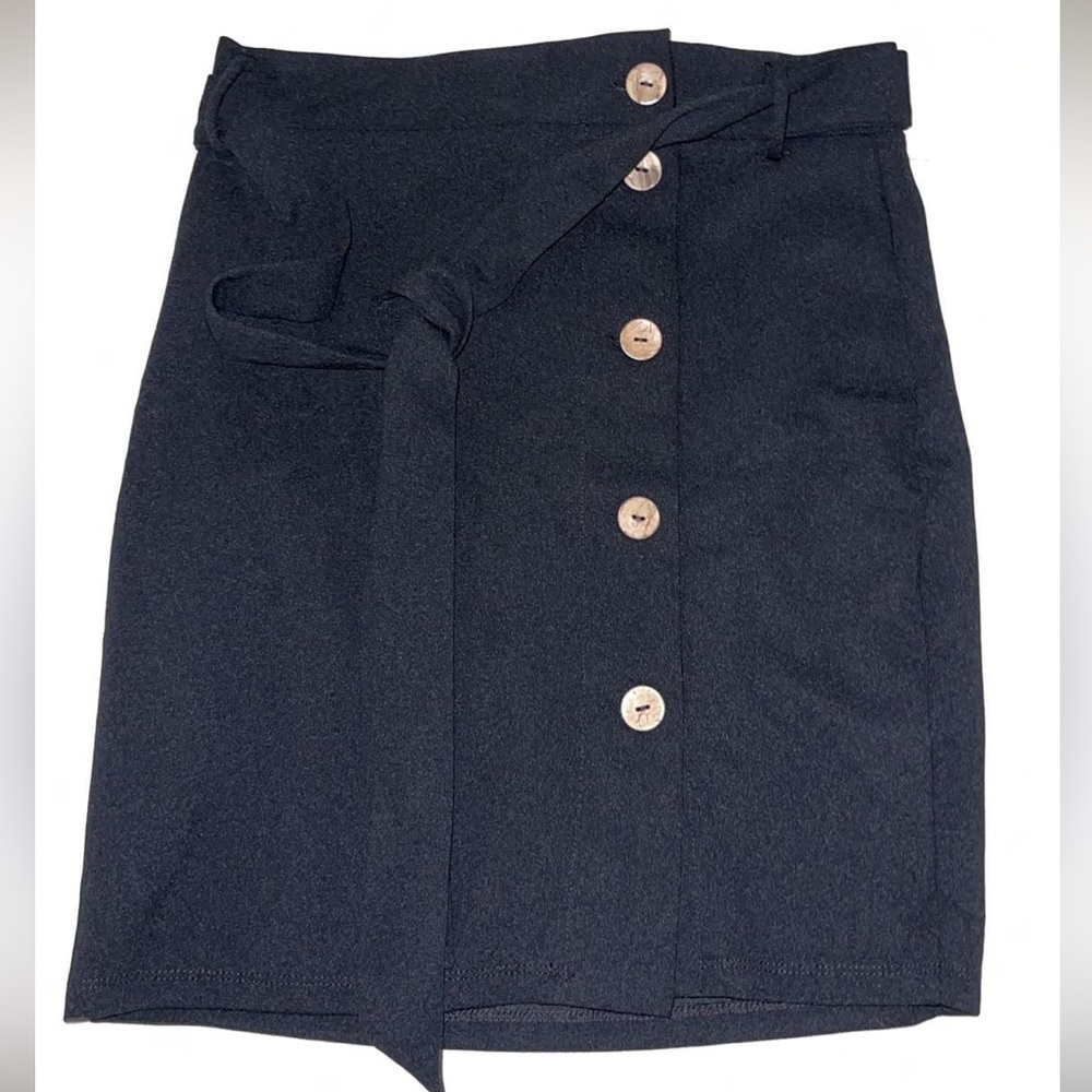 Black skirt with brown buttons. Never wore but no tags.